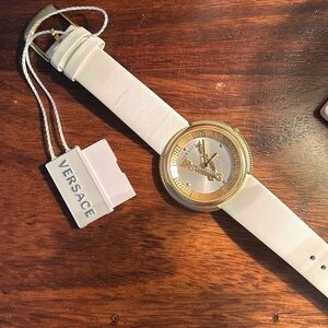 White band never worn VERSACE women’s watch with gold detail